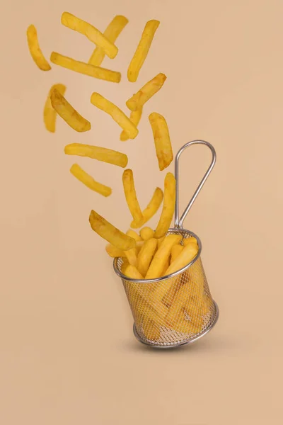 French Fries Fried Potatoes Flying Out Basket Fast Food Levitating — Stock Photo, Image