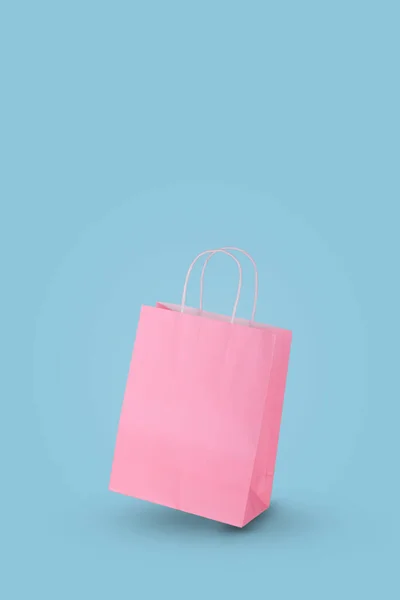 Simply Minimal Design Pink Paper Shopping Bag Isolated Blue Background — Stock Photo, Image