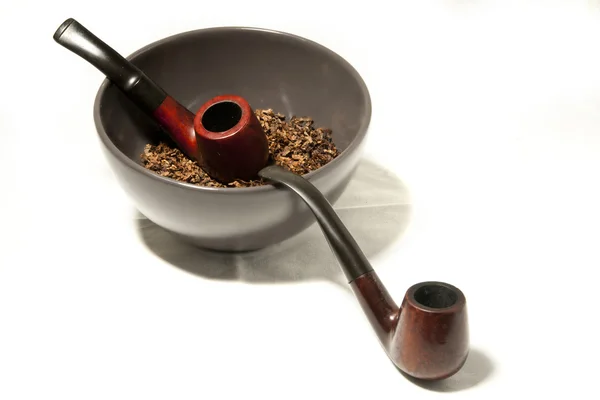Smoking pipes in bowl — Stock Photo, Image