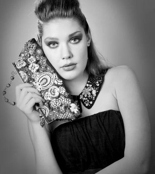 Portrait of young beautiful brunette woman wearing accessories — Stock Photo, Image