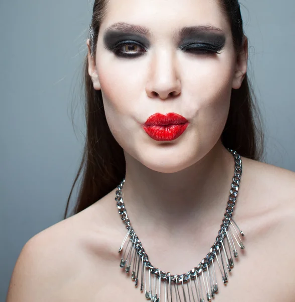 Portrait of young beautiful brunette woman wearing accessories — Stock Photo, Image