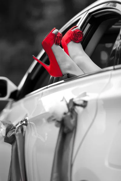 Woman legs in sexy red shoes — Stock Photo, Image