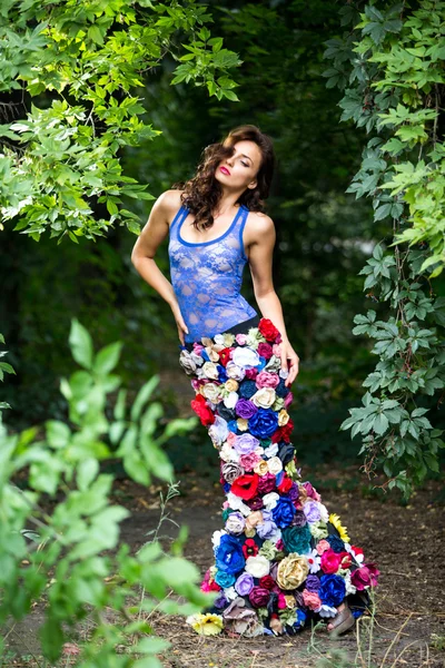 Beautiful lady in dress of flowers — Stock Photo, Image