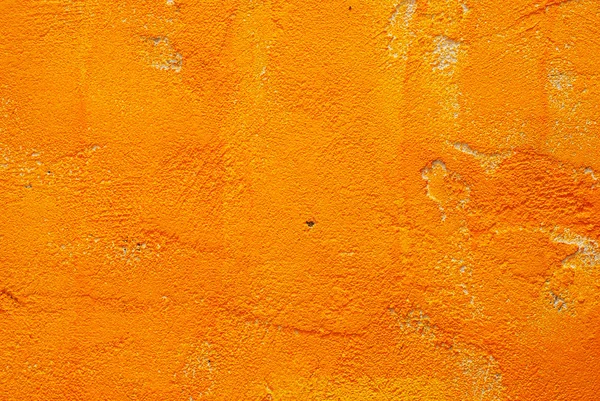 Parede de cimento de cor amarela abstrata — Fotografia de Stock
