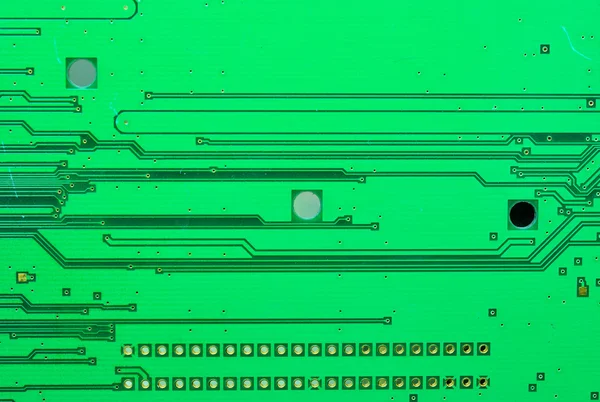 Primer plano en una parte de la textura de las viejas placas de circuitos electrónicos —  Fotos de Stock