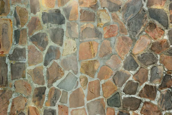 La Piedra en el fondo concertado de la textura de pared — Foto de Stock