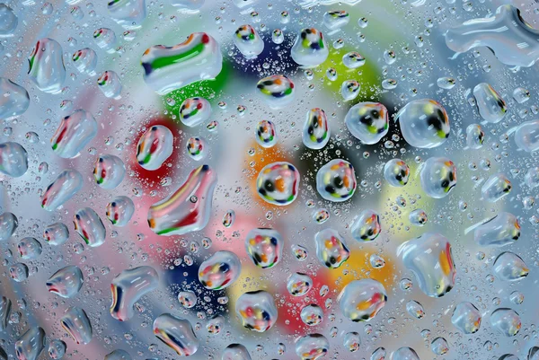 Molti colorato goccia d'acqua sfondo — Foto Stock
