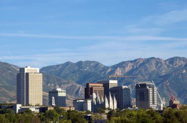 Skyline of Salt Lake City, Utah framed by the Wasatch Mountains clipart
