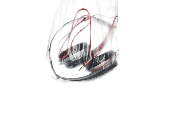 Headphone in Plastic bag — Stock Photo, Image