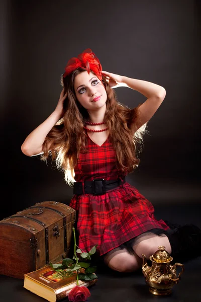 Portrait of the girl with red hairpin — Stock Photo, Image