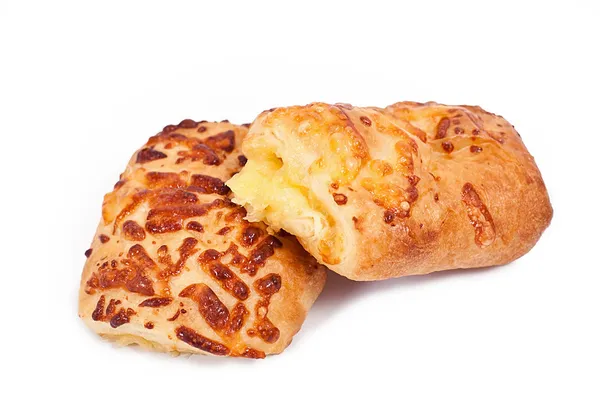 Rich white bread topped with cheese on a white background. — Stock Photo, Image