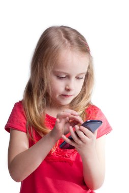 beş yıl kız cep telefonu ile oynuyor