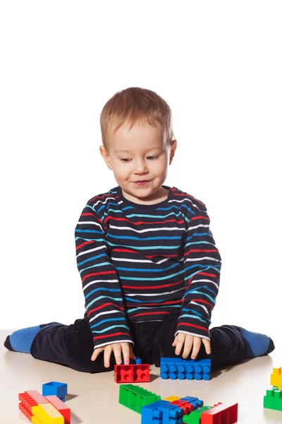 Little boy playing toy blocks isolated — Stock Photo, Image