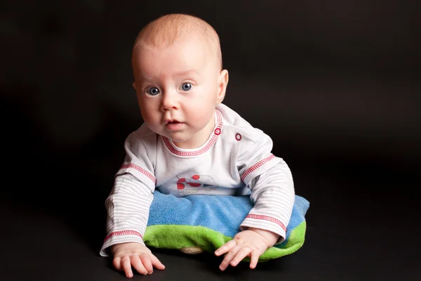 Portrait of the little boy on black background — Stock Photo, Image