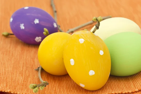 Easter eggs on orange towel — Stock Photo, Image