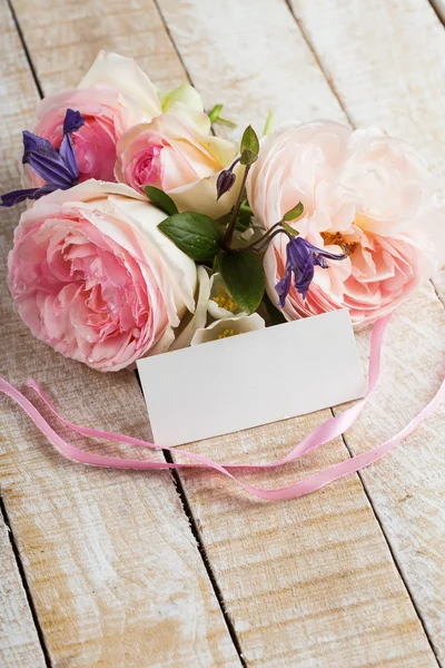 Postcard with elegant flowers and empty tag for your text — Stock Photo, Image