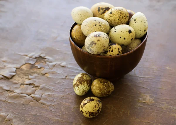 Quail eggs on wooden background — Stock Photo, Image