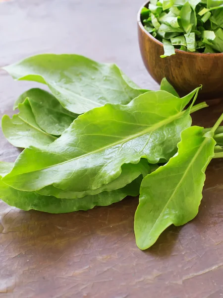 Fresh sorrel on wooden background — Stock Photo, Image