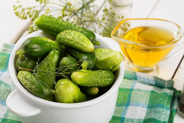 Fresh cucumbers on wooden background — Stock Photo, Image