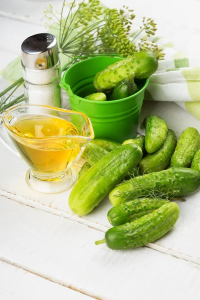 Fresh cucumbers on wooden background — Stock Photo, Image