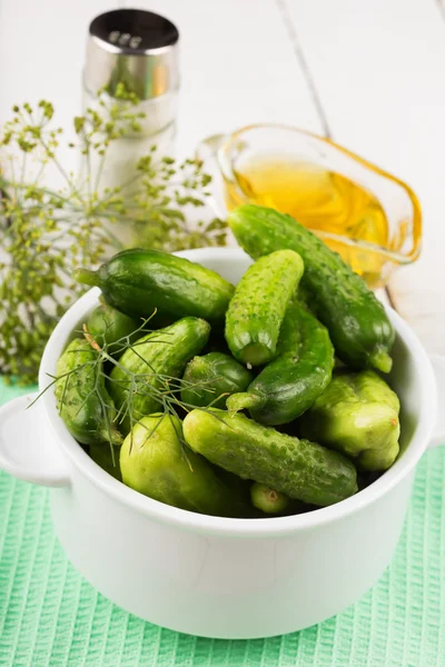 Fresh cucumbers on wooden background — Stock Photo, Image