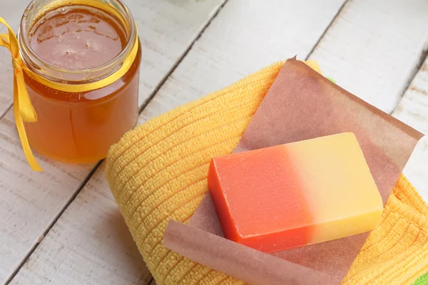 Honey spa. Bar of natural handmade soap iwith honey. — Stock Photo, Image