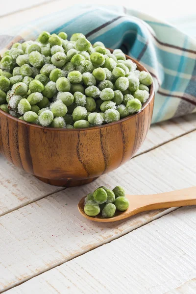 Frozen peas in bowl — Stock Photo, Image