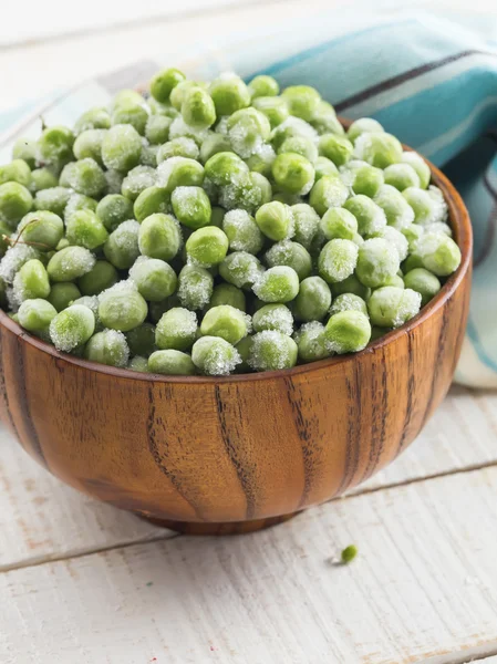 Frozen peas in bowl — Stock Photo, Image