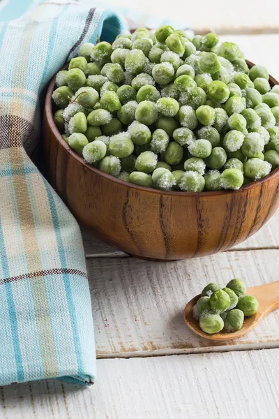 Frozen peas in bowl — Stock Photo, Image