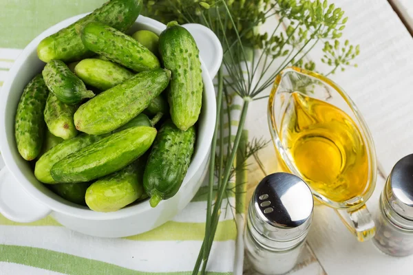 Fresh cucumbers on wooden background — Stock Photo, Image