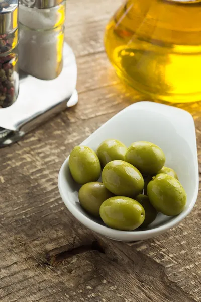 Green olive in bowl — Stock Photo, Image