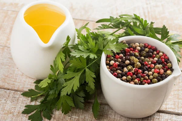 Mixed pepper, oil, parsley — Stock Photo, Image