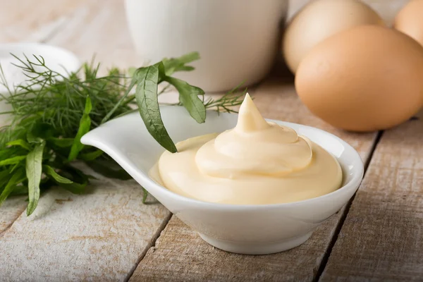 Mayonnaise in bowl on table — Stock Photo, Image