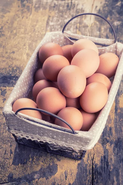 Chicken eggs on wooden background — Stock Photo, Image