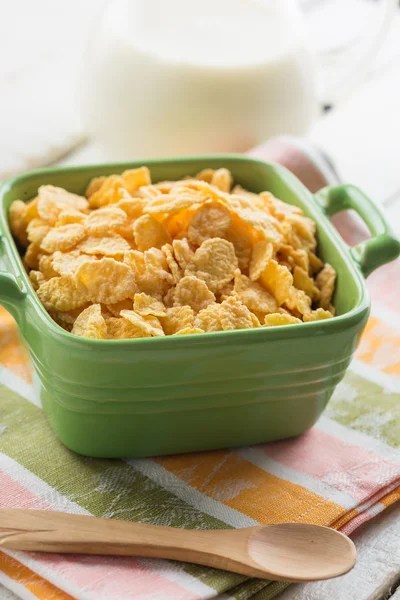 Cornflakes in bowl on table — Stock Photo, Image