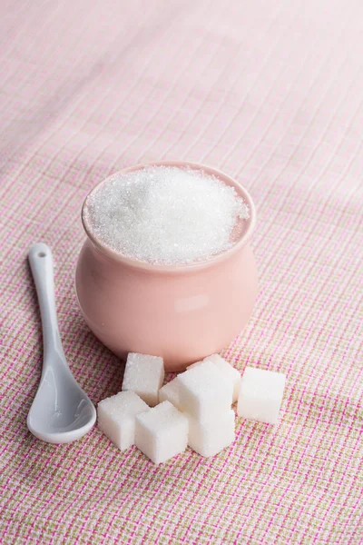 Sugar on pink background. — Stock Photo, Image