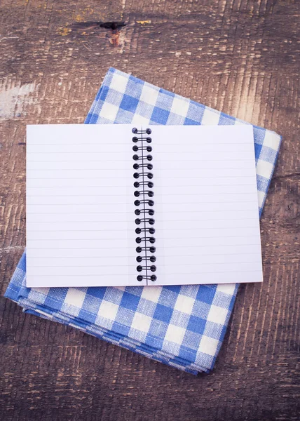 Open empty notebook on wooden background — Stock Photo, Image