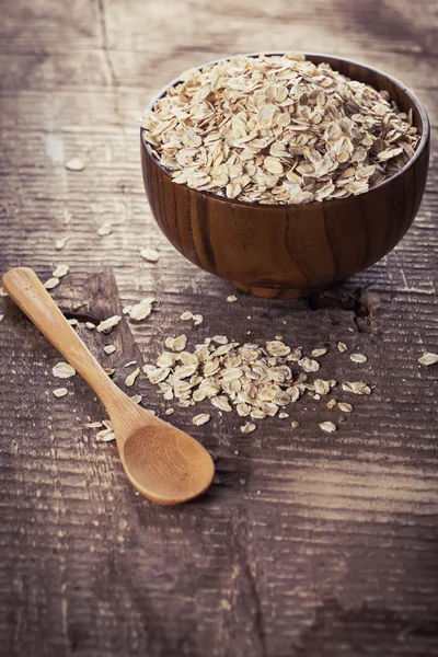 Copos de avena en tazón —  Fotos de Stock