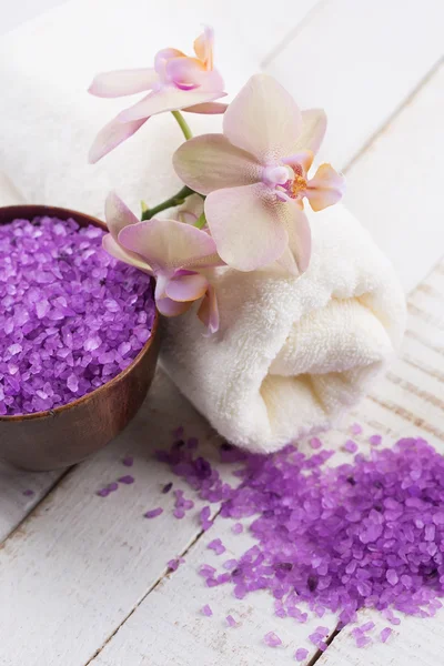 Flowers, towel and sea salt — Stock Photo, Image