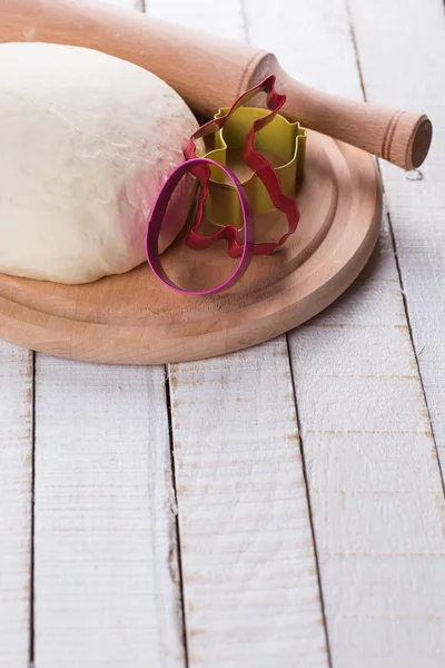 Dough on wooden board — Stock Photo, Image