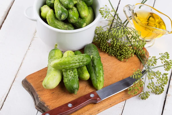 Fresh cucumbers on wooden background — Stock Photo, Image