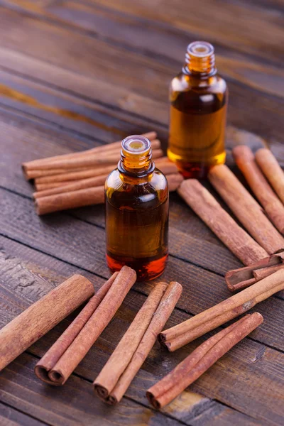 Aroma oil with cinnamon — Stock Photo, Image