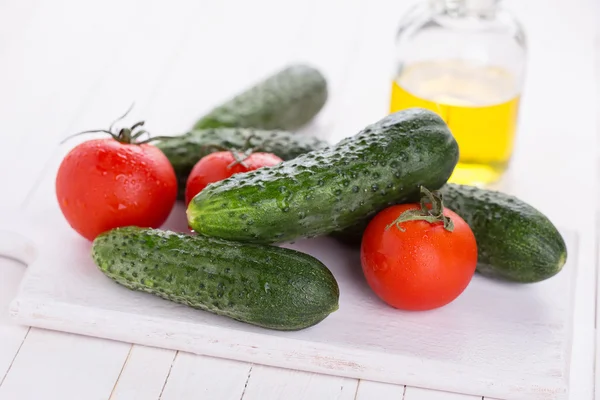 Cucumbers and tomatoes — Stock Photo, Image