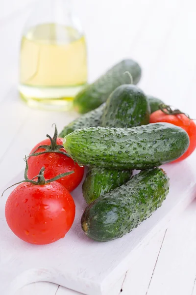 Cucumbers and tomatoes — Stock Photo, Image