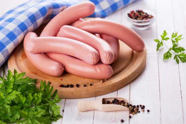 Sausages on board — Stock Photo, Image