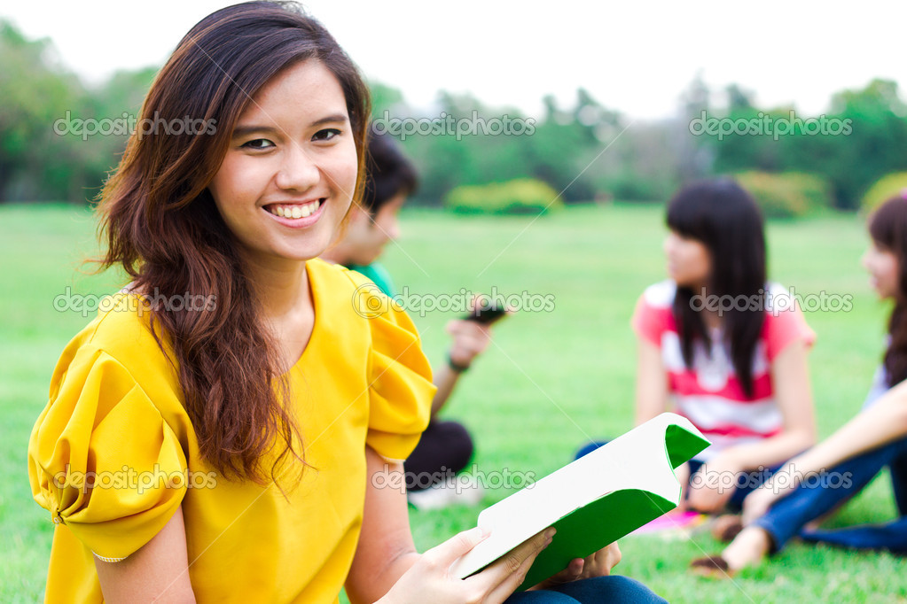 Students hanging out in the park.