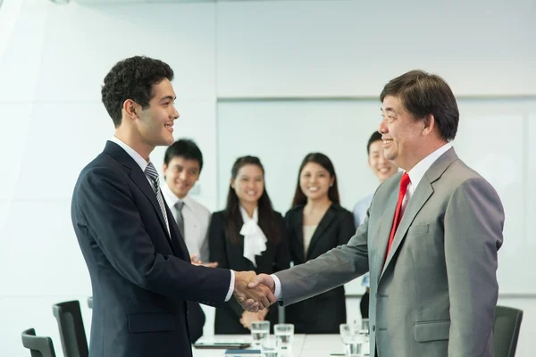 Business people handshaking — Stock Photo, Image