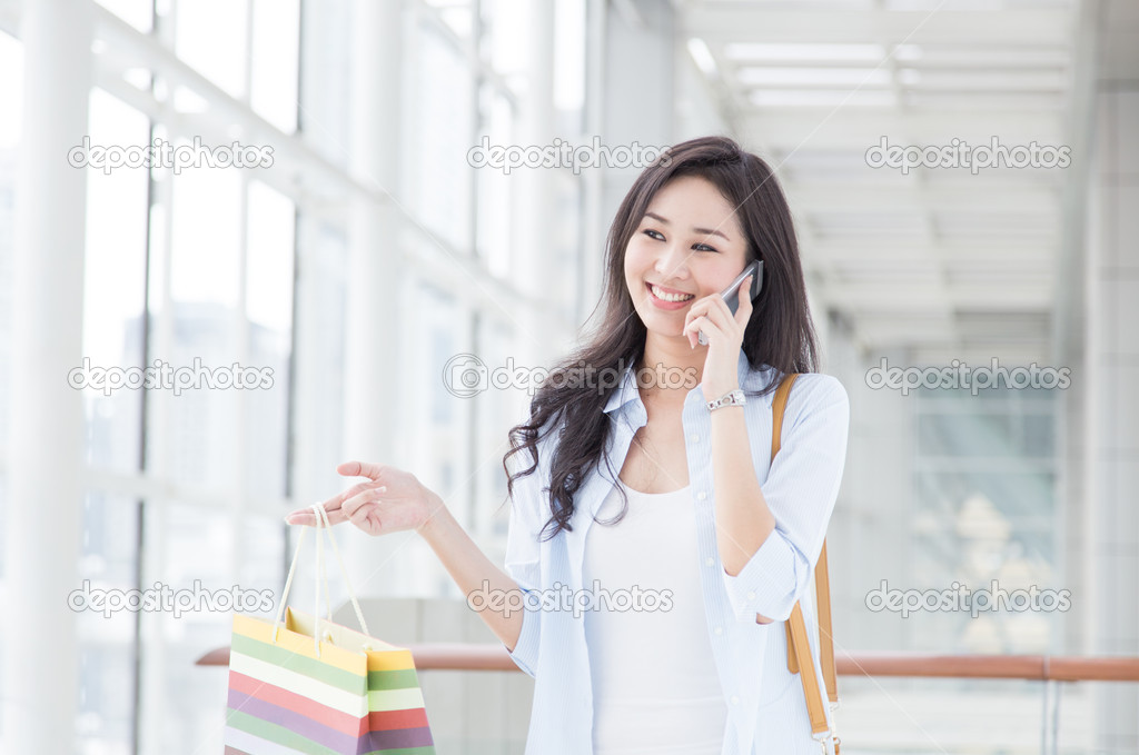 Young woman talking on the phone