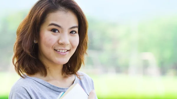 Woman with book — Stock Photo, Image