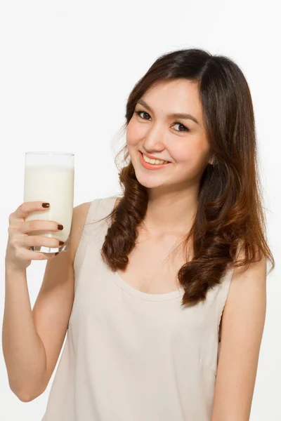 Frau mit Milch lizenzfreie Stockbilder